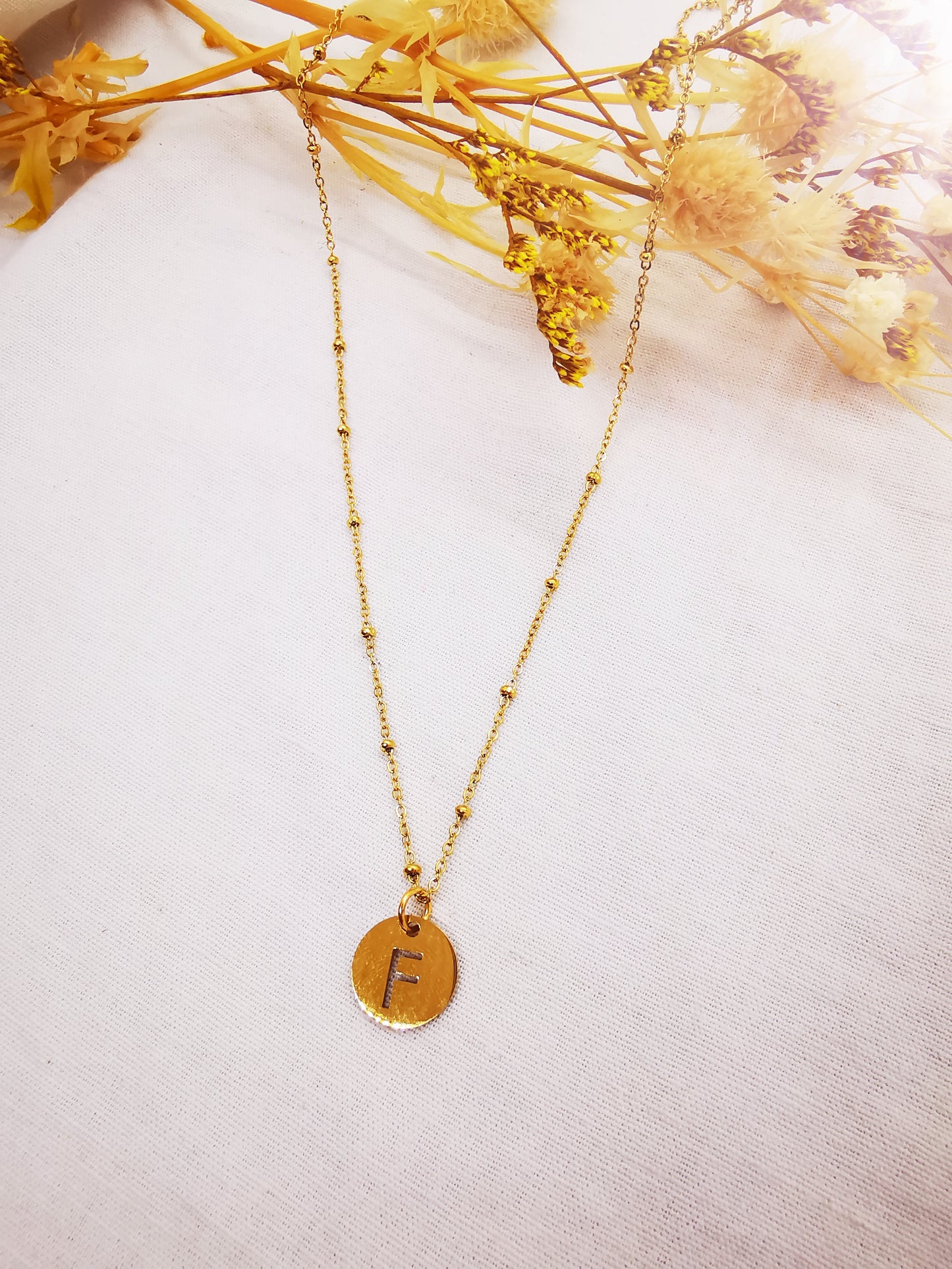 Colliers Initiale F