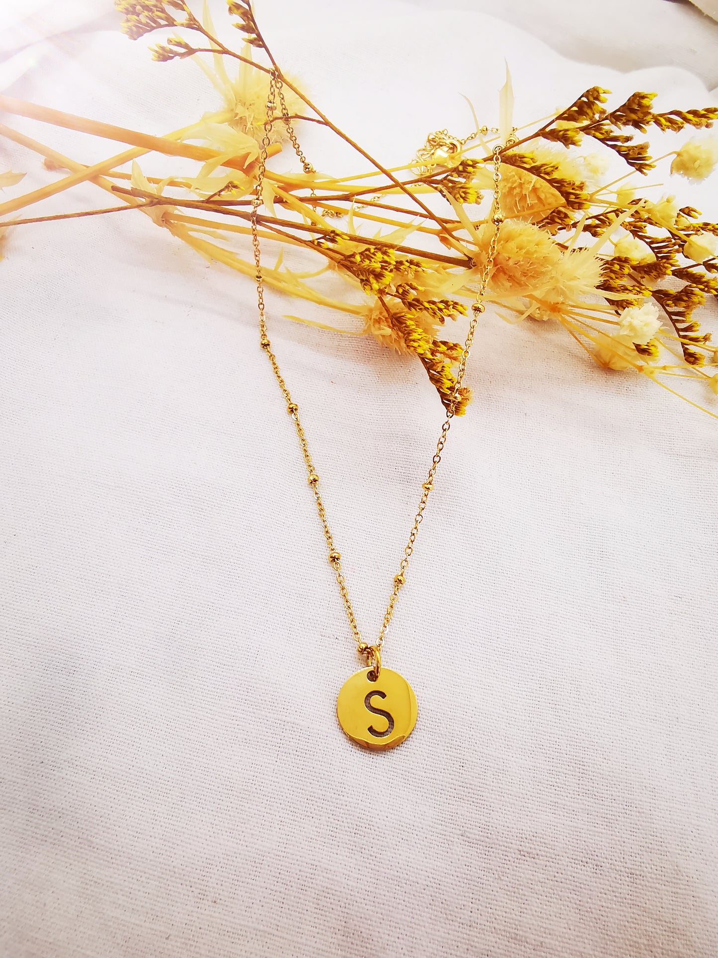 Colliers Initiale S